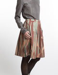 Pleated skirt with leave print