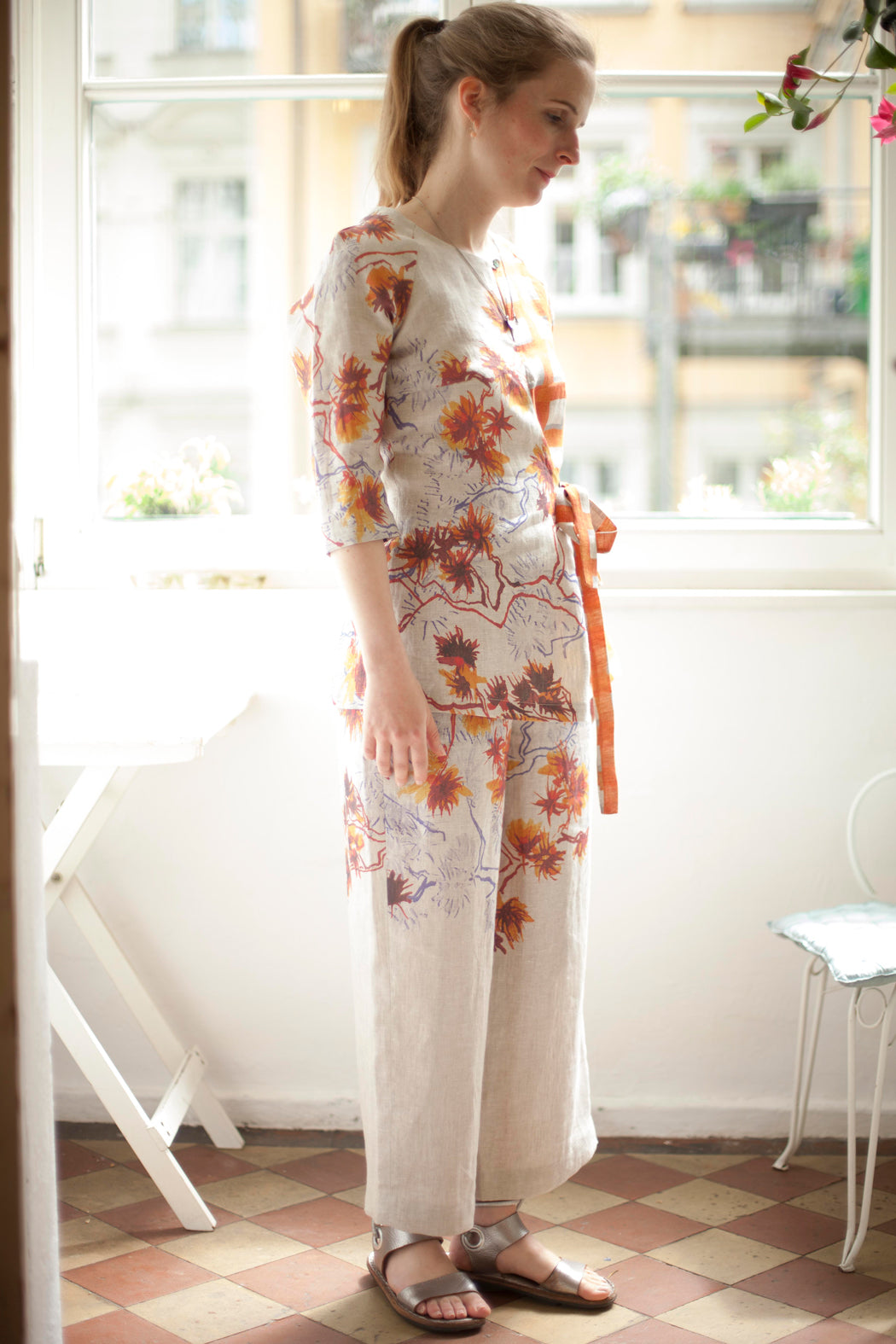 Natural linen with self designed floral print in orange