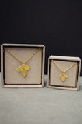 gold necklace with blossom pendant